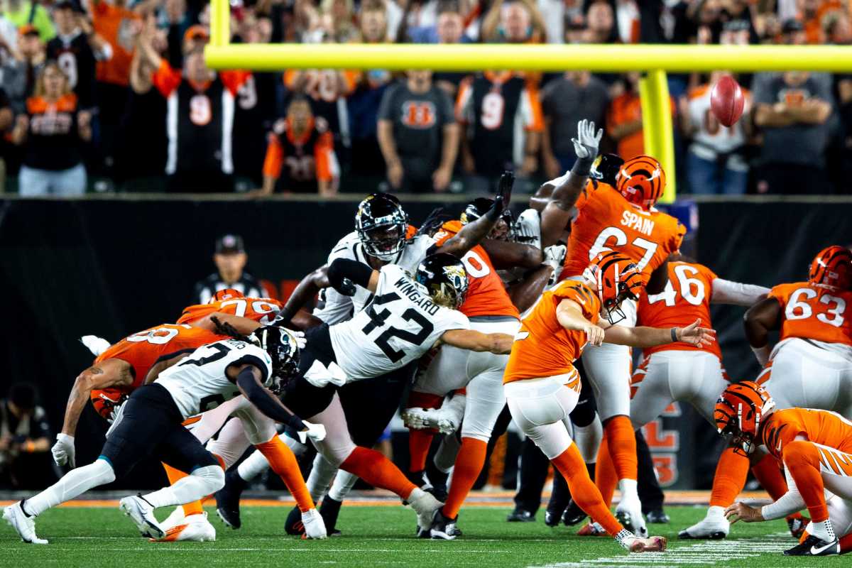 Evan McPherson kicks the game winning, walk-off field goal to defeat the Jaguars. © Albert Cesare / The Enquirer / USA TODAY NETWORK